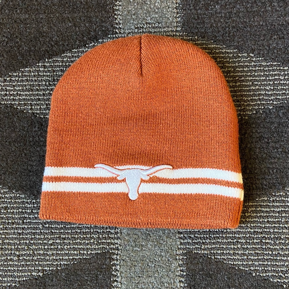 Texas Longhorns knit beanie in orange with a white steerhead logo and stripes